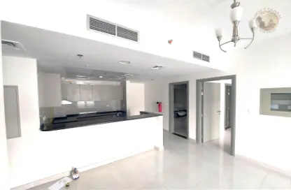 Kitchen image for: Apartment - 1 Bedroom - 2 Bathrooms for rent in Jude Residence - Nad Al Sheba 1 - Nad Al Sheba - Dubai, Image 1
