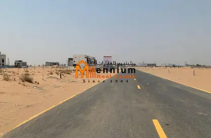 أرض - استوديو للبيع في روضة القرط - ضاحية الروضات - الشارقة