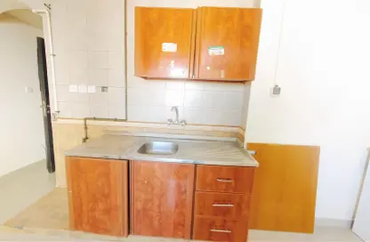 صورة لـ مطبخ شقة - 1 حمام للايجار في بناية اس جي المويلح - مويلح - الشارقة ، صورة رقم 1