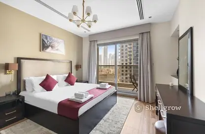 Room / Bedroom image for: Apartment - 1 Bedroom - 2 Bathrooms for rent in Elite Downtown Residence - Downtown Dubai - Dubai, Image 1