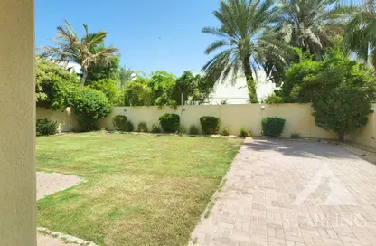 Garden image for: Villa - 4 Bedrooms - 5 Bathrooms for rent in Meadows 1 - Meadows - Dubai, Image 1