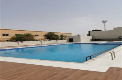 Pool image for: Compound - 5 Bedrooms - 7 Bathrooms for rent in Mohamed Bin Zayed City - Abu Dhabi, Image 1