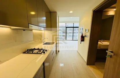 صورة لـ مطبخ شقة - 1 حمام للايجار في عزيزي ريفيرا - ميدان واحد - ميدان - دبي ، صورة رقم 1