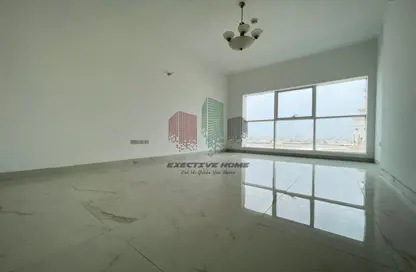 Empty Room image for: Apartment - 2 Bedrooms - 2 Bathrooms for rent in Mina Tower - Mina Road - Tourist Club Area - Abu Dhabi, Image 1