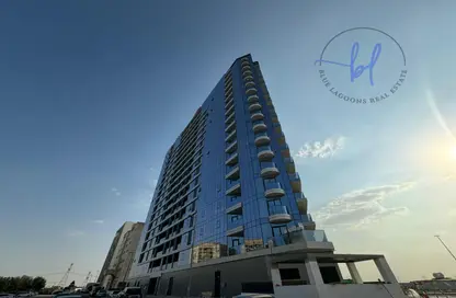 Outdoor Building image for: Apartment - 1 Bedroom - 2 Bathrooms for sale in The V Tower - Dubai Residence Complex - Dubai, Image 1