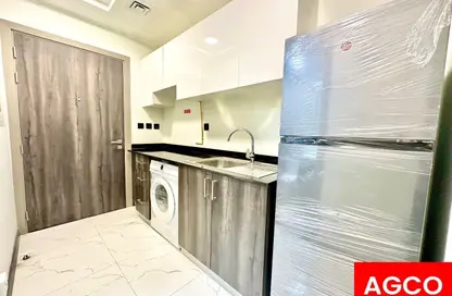 شقة - 1 حمام للايجار في برج روكان B - برج روكان - دبي لاند - دبي