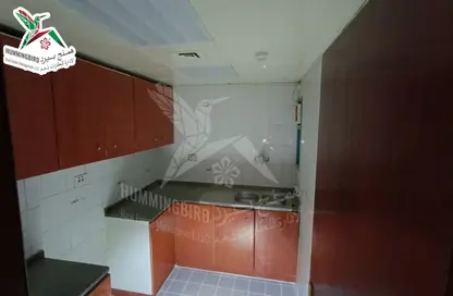Kitchen image for: Apartment - 3 Bedrooms - 3 Bathrooms for rent in Hai Al Murabbaa - Central District - Al Ain, Image 1