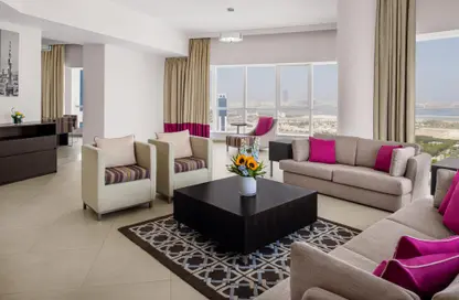 Living Room image for: Hotel  and  Hotel Apartment - 4 Bedrooms - 4 Bathrooms for rent in Aparthotel Adagio Premium Dubai Al Barsha - Al Barsha - Dubai, Image 1