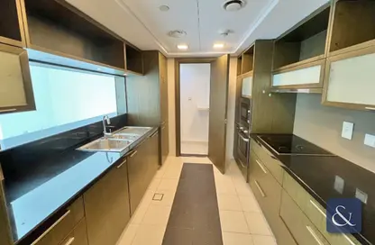 صورة لـ مطبخ شقة - غرفة نوم - 2 حمامات للايجار في لوفتس إيست - ذا لوفت - دبي وسط المدينة - دبي ، صورة رقم 1