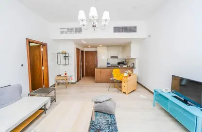 Living Room image for: Apartment - 1 Bedroom - 2 Bathrooms for sale in Hameni Tower - Jumeirah Village Circle - Dubai, Image 1