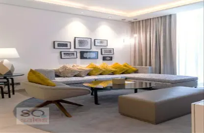 صورة لـ غرفة المعيشة النزل و الشقق الفندقية - 2 غرف نوم - 3 حمامات للايجار في جراند ميركيور مطار دبي - منطقة القرهود - دبي ، صورة رقم 1