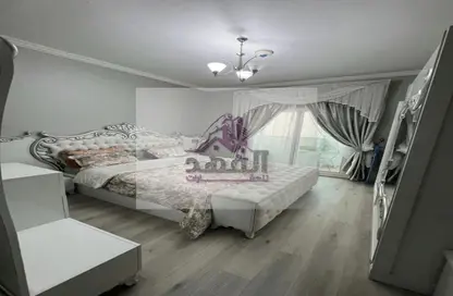 Room / Bedroom image for: Apartment - 1 Bedroom - 2 Bathrooms for rent in Orient Tower 2 - Orient Towers - Al Bustan - Ajman, Image 1