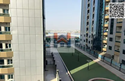 شقة - غرفة نوم - 2 حمامات للايجار في أورينت تاور 1 - أورينت تاور - البستان - عجمان