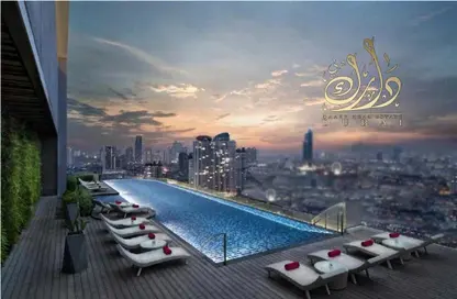 صورة لـ حوض سباحة شقة - 2 غرف نوم - 3 حمامات للبيع في اي جي سكوير - مجمع دبي ريزيدنس - دبي ، صورة رقم 1