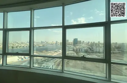 شقة - غرفة نوم - 2 حمامات للايجار في أورينت تاور 1 - أورينت تاور - البستان - عجمان
