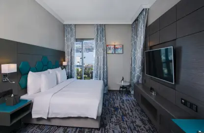 صورة لـ غرفة- غرفة النوم النزل و الشقق الفندقية - غرفة نوم - 1 حمام للايجار في فندق إيدج كريكسايد - ديرة - دبي ، صورة رقم 1