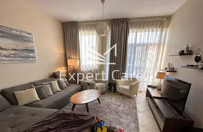 Living Room image for: Apartment - 1 Bedroom - 2 Bathrooms for sale in Regent House 2 - Regent House - Motor City - Dubai, Image 1