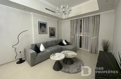 صورة لـ غرفة المعيشة شقة - غرفة نوم - 2 حمامات للبيع في برج دنيا - برج خليفة - دبي وسط المدينة - دبي ، صورة رقم 1