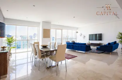 Living / Dining Room image for: Apartment - 4 Bedrooms - 5 Bathrooms for sale in West Avenue Tower - Dubai Marina - Dubai, Image 1