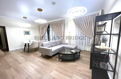 Living / Dining Room image for: Apartment - 1 Bedroom - 2 Bathrooms for rent in Burj Views B - Burj Views - Downtown Dubai - Dubai, Image 1
