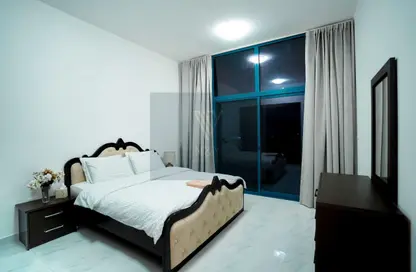 صورة لـ غرفة- غرفة النوم شقة - غرفة نوم - 2 حمامات للايجار في برج سيدني - قرية الجميرا سركل - دبي ، صورة رقم 1