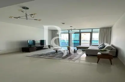 Living Room image for: Apartment - 1 Bedroom - 2 Bathrooms for sale in Julfar Residence - City Of Lights - Al Reem Island - Abu Dhabi, Image 1