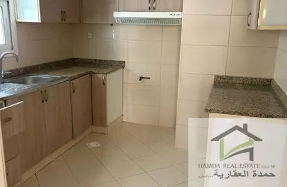 شقة - غرفة نوم - 2 حمامات للايجار في مجمع مويلح - تجارية مويلح - الشارقة
