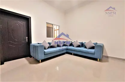 صورة لـ غرفة المعيشة شقة - غرفة نوم - 1 حمام للايجار في شارع السعادة - المشرف - أبوظبي ، صورة رقم 1