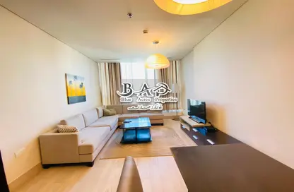 Living Room image for: Apartment - 1 Bedroom - 1 Bathroom for rent in Zakher MAAM Residence - Al Najda Street - Abu Dhabi, Image 1