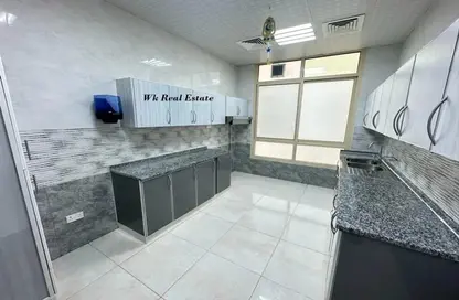 Kitchen image for: Apartment - 2 Bedrooms - 3 Bathrooms for rent in Khalifa City A - Khalifa City - Abu Dhabi, Image 1