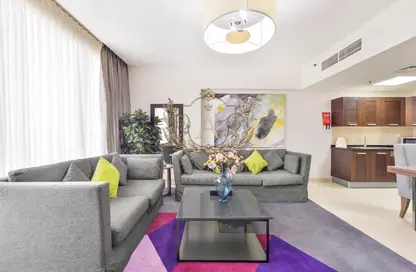 Living Room image for: Apartment - 1 Bedroom - 2 Bathrooms for rent in Nassima Tower - Sheikh Zayed Road - Dubai, Image 1