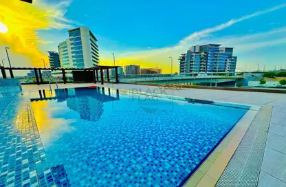 Pool image for: Apartment - 2 Bedrooms - 3 Bathrooms for rent in Canal View Building - Al Raha Beach - Abu Dhabi, Image 1