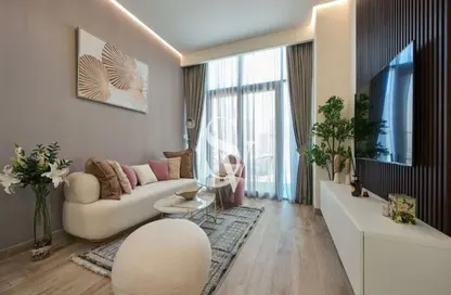 Living Room image for: Apartment - 1 Bedroom - 2 Bathrooms for sale in 7 Park Central - Jumeirah Village Circle - Dubai, Image 1