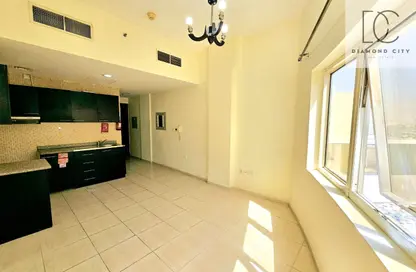 Apartment - Studio - 1 Bathroom for rent in Silicon Gates 2 - Silicon Gates - Dubai Silicon Oasis - Dubai