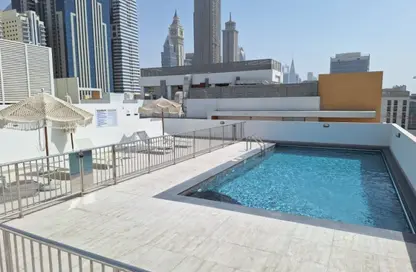 Apartment - 1 Bedroom - 2 Bathrooms for rent in Jumeirah Garden City - Al Satwa - Dubai