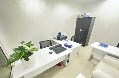 Office Space - Studio - 2 Bathrooms for rent in Al Rostamani Building - Port Saeed - Deira - Dubai
