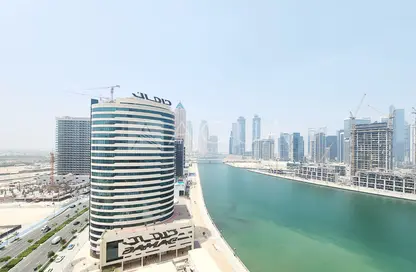 صورة لـ منظر مائي. مكتب - استوديو للايجار في برج الأعمال - الخليج التجاري - دبي ، صورة رقم 1