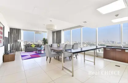 Living / Dining Room image for: Hotel  and  Hotel Apartment - 2 Bedrooms - 2 Bathrooms for rent in Nassima Tower - Sheikh Zayed Road - Dubai, Image 1