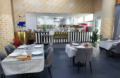 Living / Dining Room image for: Shop - Studio - 2 Bathrooms for sale in Al Khalidiya - Abu Dhabi, Image 1