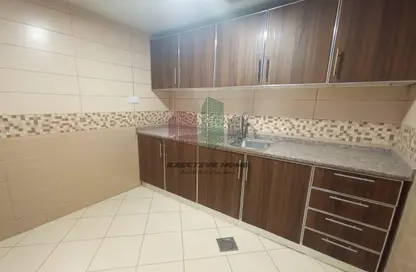 Kitchen image for: Apartment - 1 Bathroom for rent in Liwa Centre Towers - Hamdan Street - Abu Dhabi, Image 1