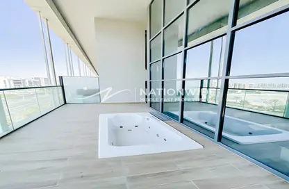 Pool image for: Apartment - 2 Bedrooms - 3 Bathrooms for sale in Al Raha Lofts - Al Raha Beach - Abu Dhabi, Image 1