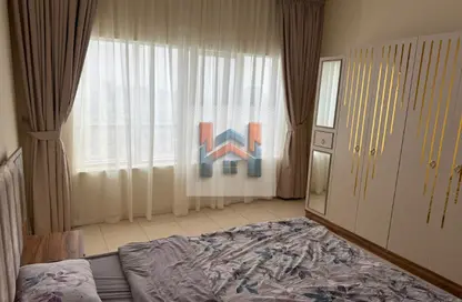 Apartment - 1 Bedroom - 2 Bathrooms for sale in Orient Tower 2 - Orient Towers - Al Bustan - Ajman