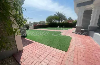 Garden image for: Villa - 5 Bedrooms for sale in Western Residence South - Falcon City of Wonders - Dubai, Image 1