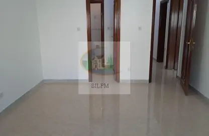Empty Room image for: Apartment - 3 Bedrooms - 3 Bathrooms for rent in Al Karamah - Abu Dhabi, Image 1