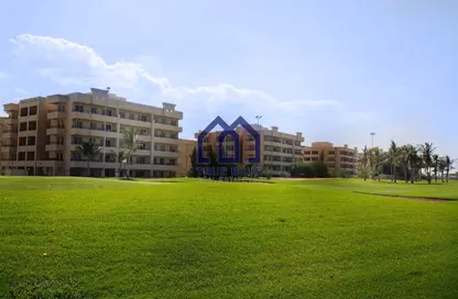 Outdoor Building image for: Apartment - 1 Bedroom - 2 Bathrooms for sale in Golf Apartments - Al Hamra Village - Ras Al Khaimah, Image 1