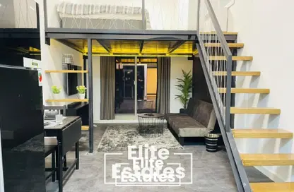 Apartment - Studio - 1 Bathroom for rent in Plazzo Heights - Jumeirah Village Circle - Dubai