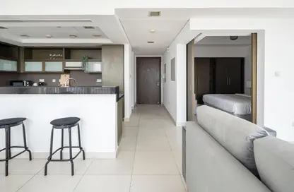 صورة لـ مطبخ شقة - غرفة نوم - 1 حمام للبيع في لوفتس ويست - ذا لوفت - دبي وسط المدينة - دبي ، صورة رقم 1
