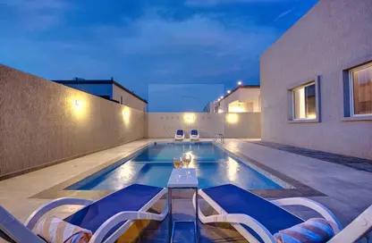 Pool image for: Villa - 3 Bedrooms - 3 Bathrooms for rent in Al Jazirah Al Hamra - Ras Al Khaimah, Image 1