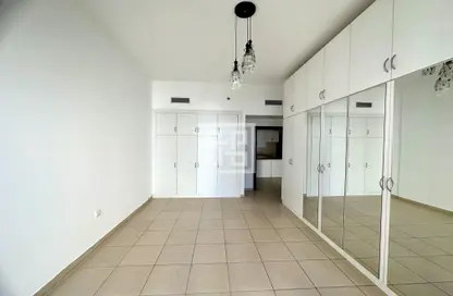 Empty Room image for: Apartment - 1 Bedroom - 1 Bathroom for sale in Oakwood Residency - Dubai Production City (IMPZ) - Dubai, Image 1