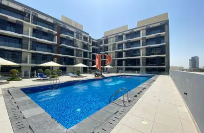 Pool image for: Apartment - 1 Bedroom - 2 Bathrooms for sale in Rigel - Jumeirah Village Circle - Dubai, Image 1